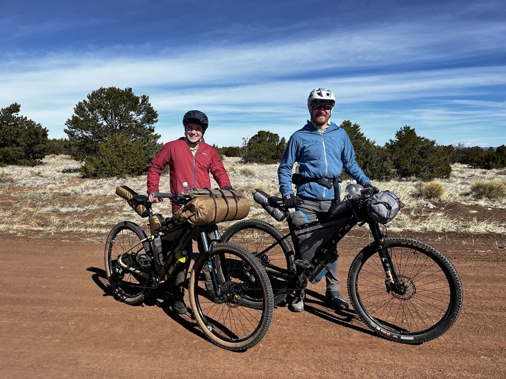 2 bikepackers posing for a photo along the Arizona Trail